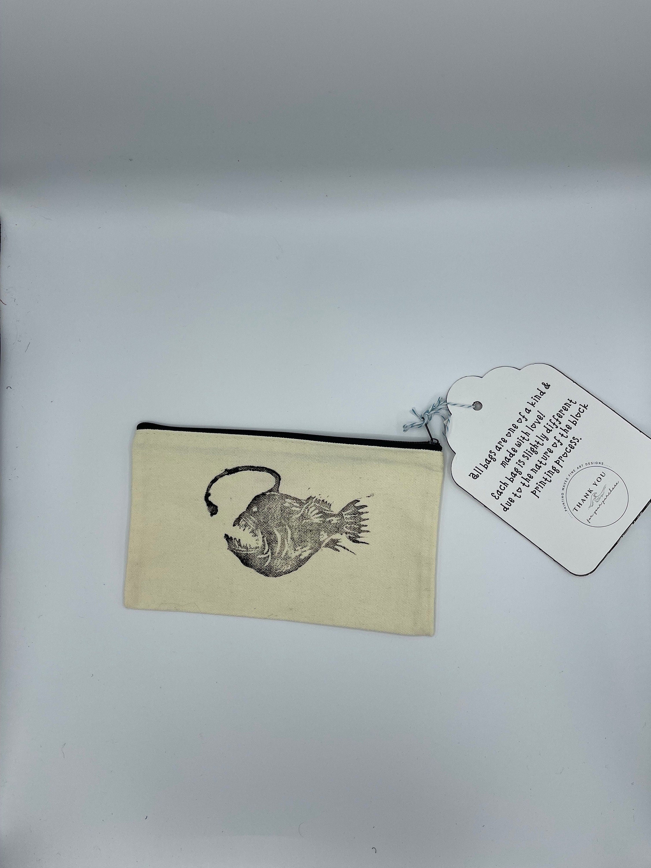 angler fish makeup bag
