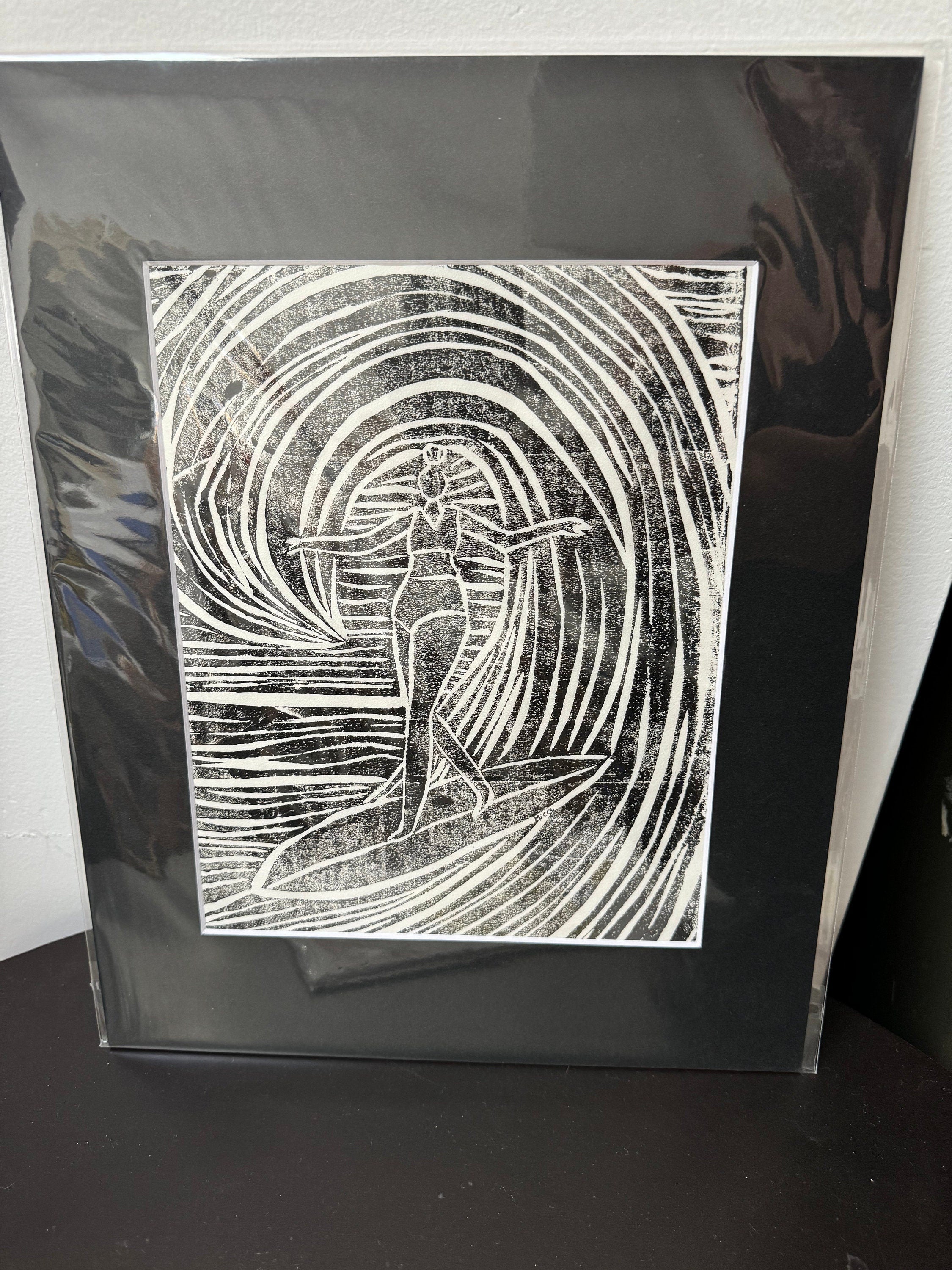 Surfer Girl on a wave   linoleum block print