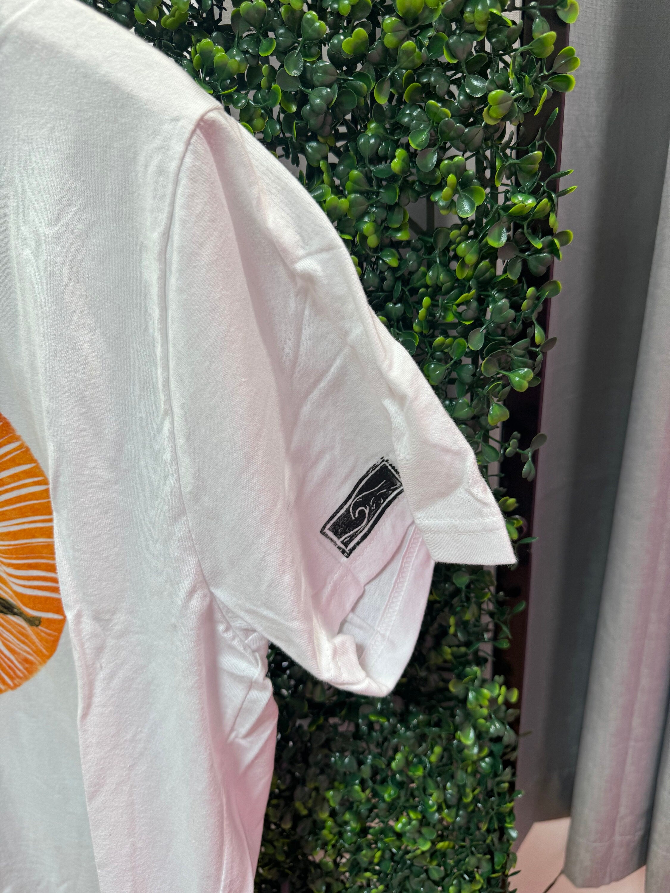 surfer girl wave white hand printed block printed T-shirt with orange sun